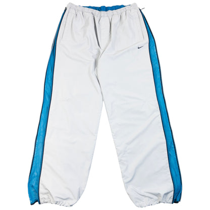 Vintage 2000s Nike Full Mesh Zip Tracksuit Bottoms in grey, full side zips with mesh paneling