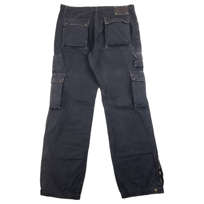 DOLCE & GABBANA black cargo trousers with multiple flap pockets and reinforced knee patches.