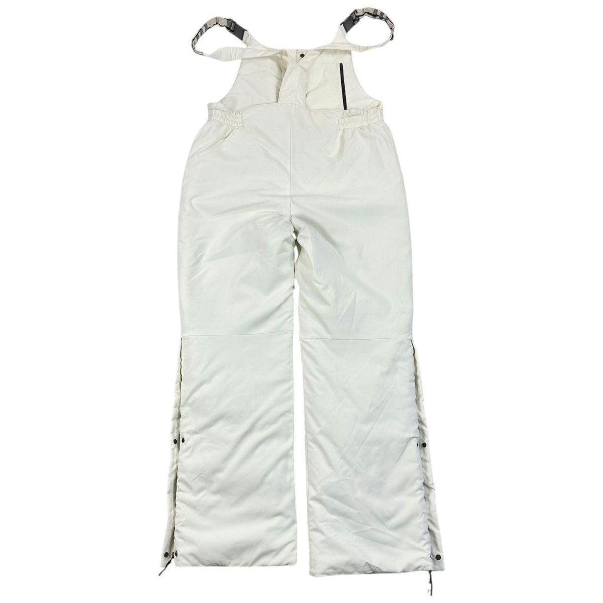 Burberry white ski overalls with logo detail on chest and adjustable straps.