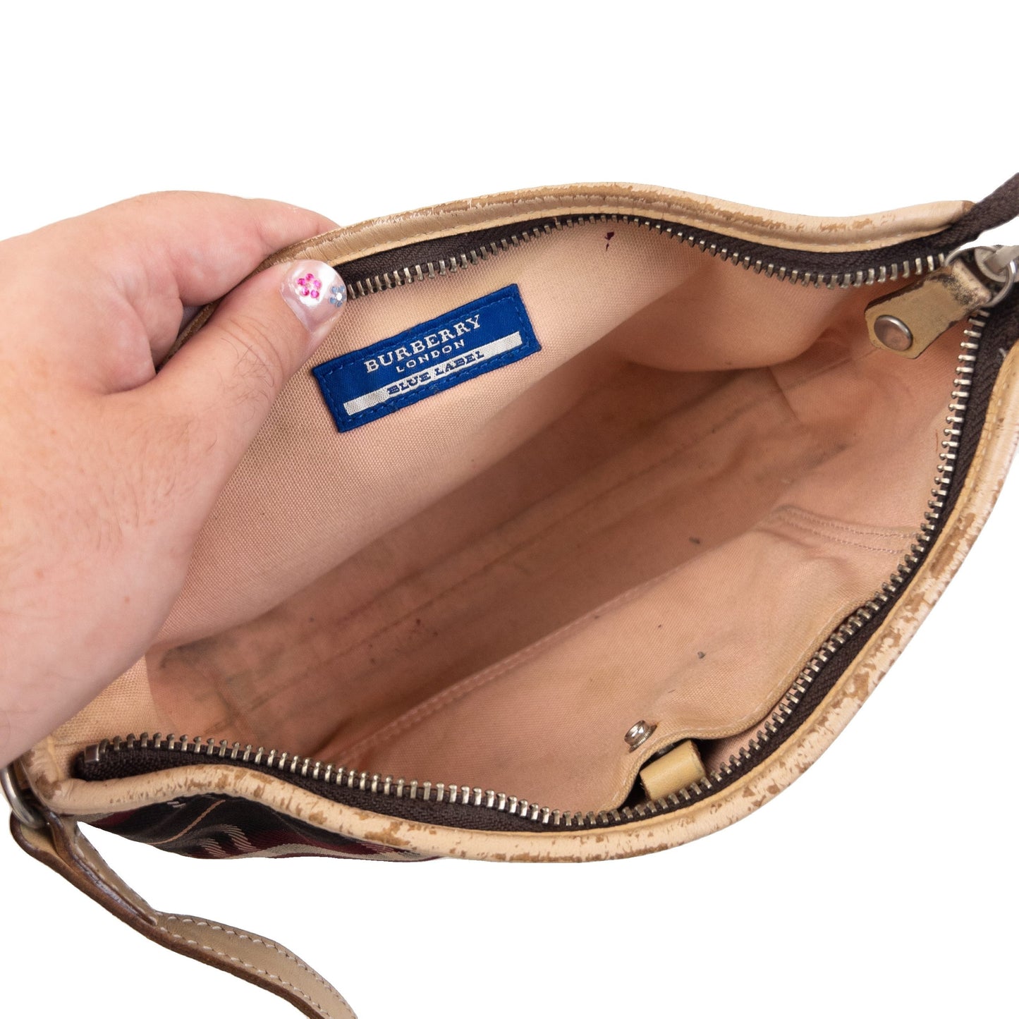 Burberry beige crossbody bag featuring classic Nova Check pattern and branded metal studs.