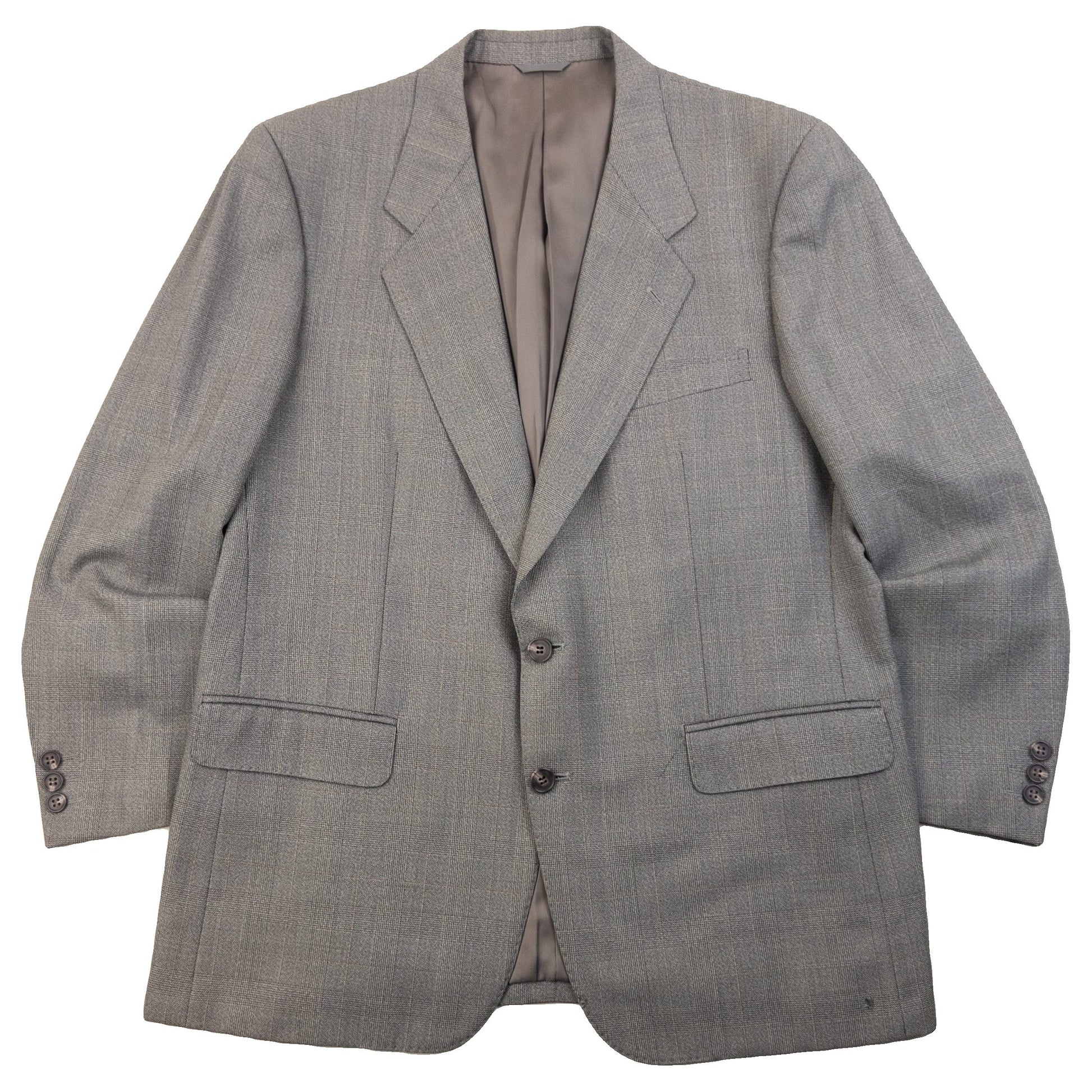 BALENCIAGA grey checkered suit set featuring a two-button jacket with flap pockets and pleated trousers