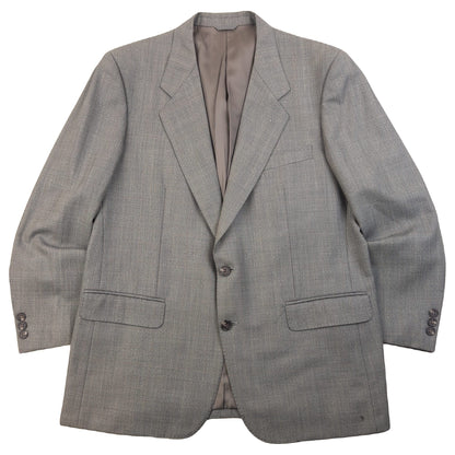 BALENCIAGA grey checkered suit set featuring a two-button jacket with flap pockets and pleated trousers