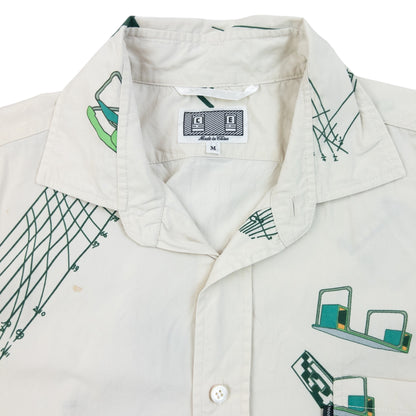 Cav Empt blue and white button-up shirt with abstract geometric print and single chest pocket.