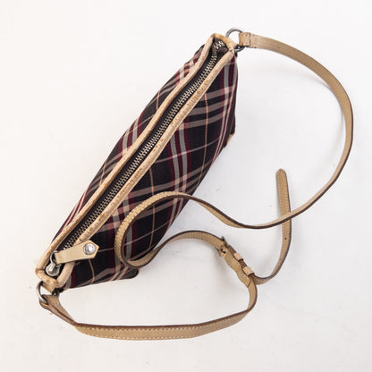 Burberry beige crossbody bag featuring classic Nova Check pattern and branded metal studs.