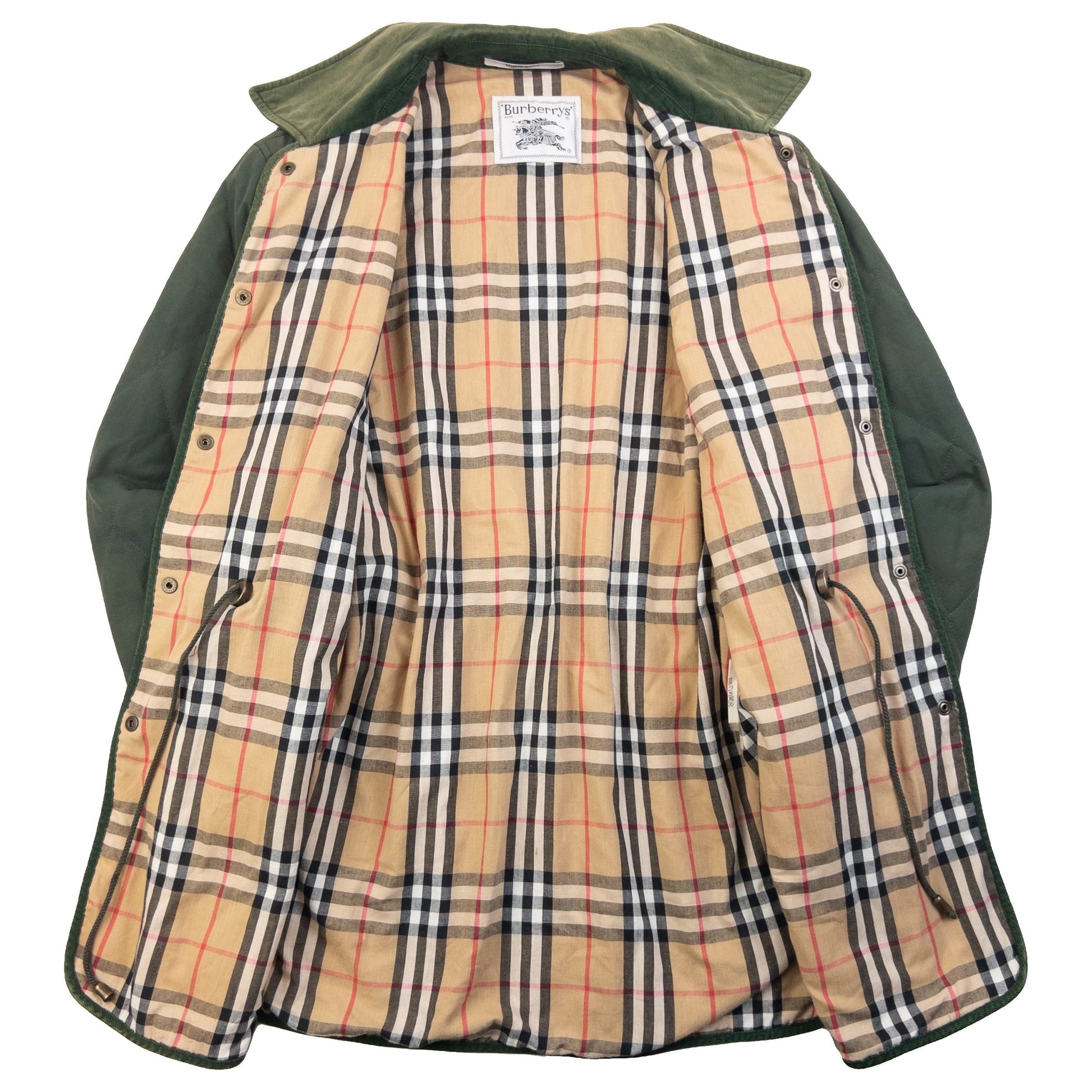 Burberry green quilted jacket with Nova Check lining, snap button closure, and corduroy collar.